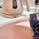 Filling a water bottle from the tap in Japan