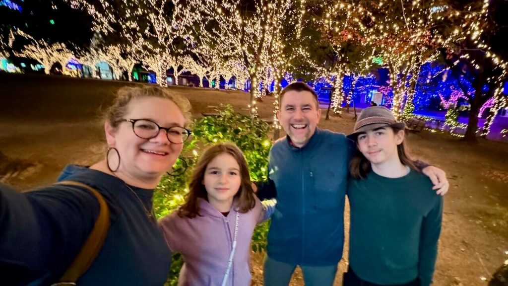 Family of four with holiday lights in Fukuoka, Japan