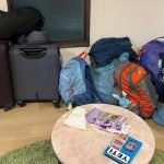 Luggage for a traveling family of four: Ours currently includes two rolling suitcases, one duffel, and four backpacks