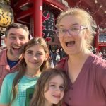 Family of four at Senso-ji temple in Asakusa, Tokyo, Japan