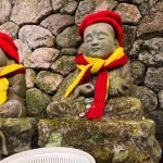 During winter in Japan, don't be surprised if temple statues are wearing hats and scarves
